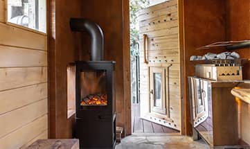 Ofen der finnischen Blockhaussauna