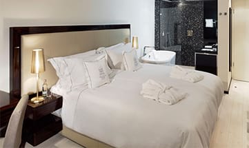 Zimmer Deluxe Room mit Patio / eigener Terrasse